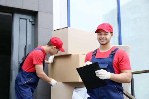 Local movers handling a home relocation in Lee residential street