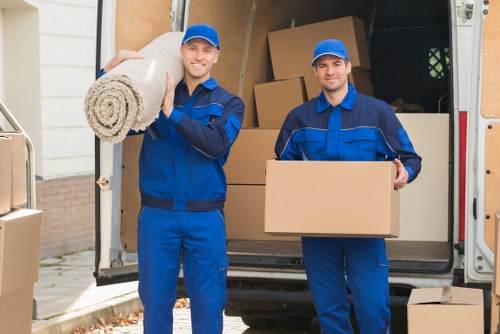 Man and van team loading items with care for a local move