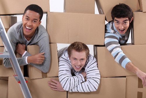 Professional movers handling student belongings in Lee