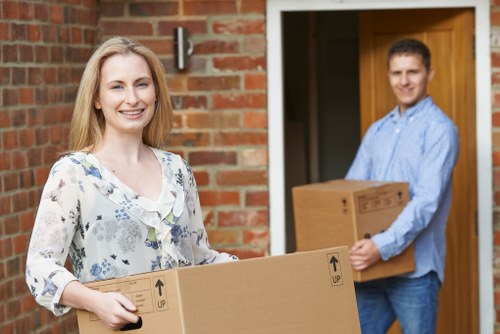 Careful handling of fragile items during packing services in Lee