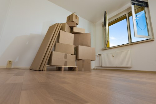 Packing boxes and protective materials prepared for a move in Lee