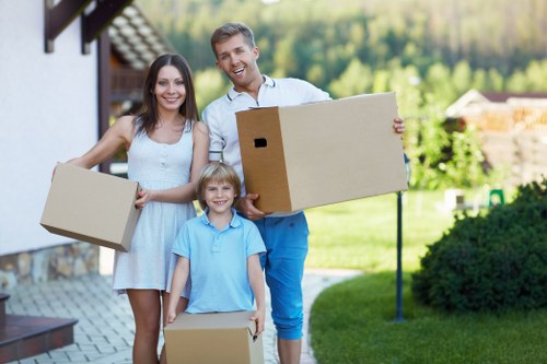 Settling into a new home after moving in Lee with unpacked boxes