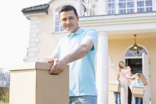 Man And Van Lee moving team using protective safety measures during a relocation