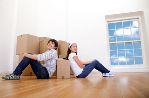 Team handling household items during a man and van removal
