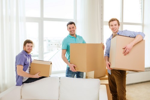 Employees organizing a commercial relocation schedule in Lee