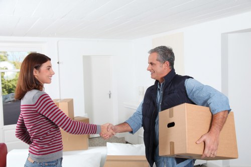 Packing supplies and labelled boxes for a home move in Lee