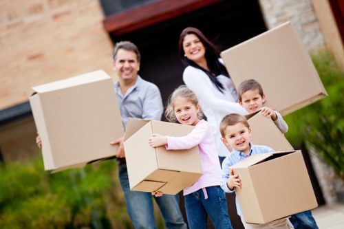 House moving team handling furniture removals in Lee