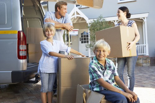 Office furniture removals in Lee with desks and chairs being transported