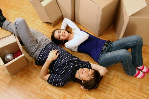 Local moving team preparing items for delivery in Lee